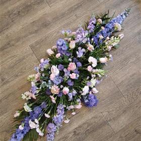 fwthumbLilac delphinium and pale pink rose coffin spray.jpg